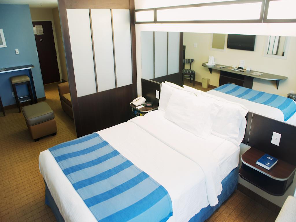 Three Rivers Inn & Suites Порт-Артур Номер фото