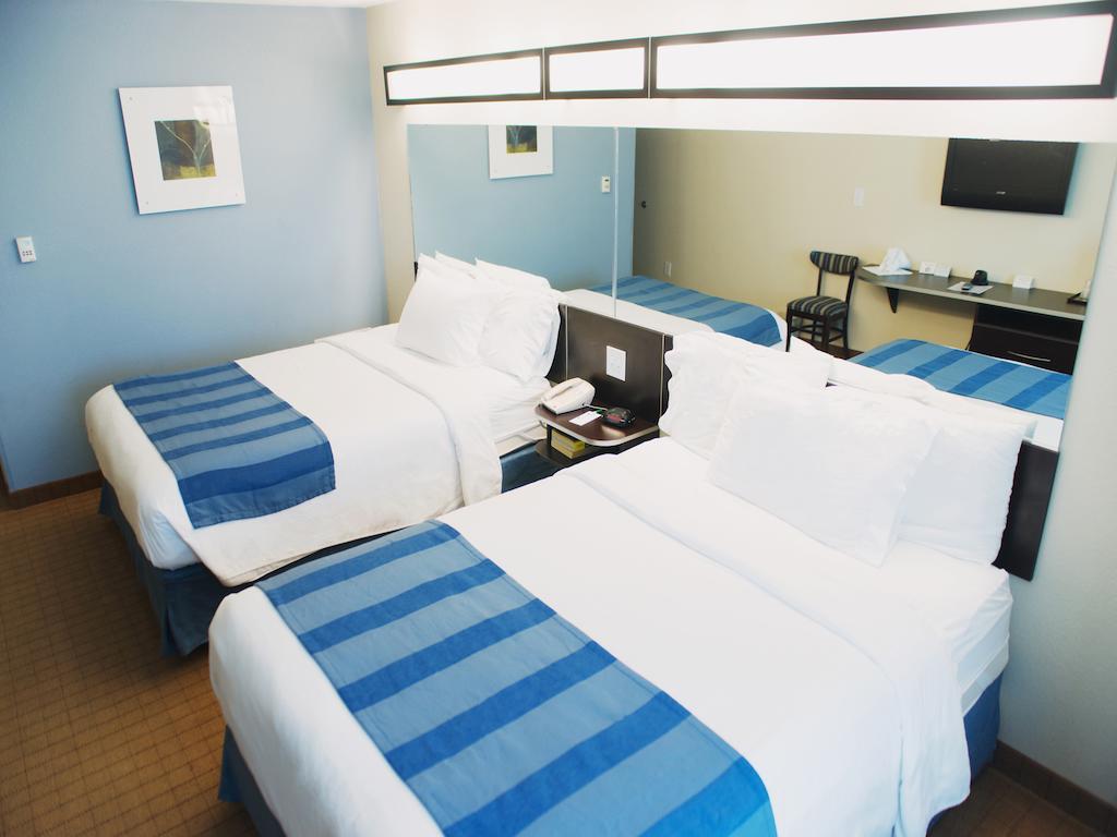 Three Rivers Inn & Suites Порт-Артур Номер фото